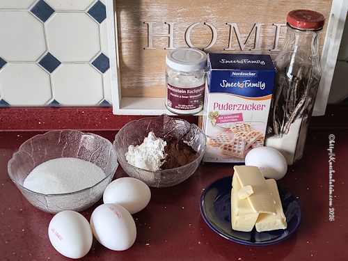 Zutaten Drömtårta - Traumrolle Butter, Zucker, Puderzucker, Eier, Butter Kakao, Backpulver